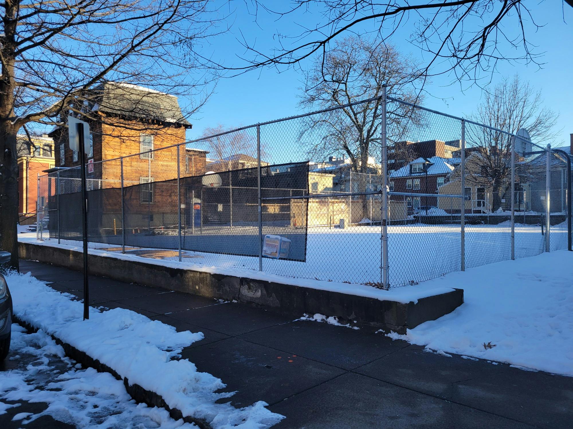 30 Wendell Street Site with snow on tennis court